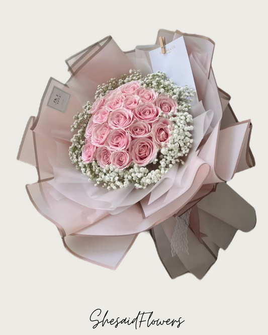 Bouquet de 10 roses de tons rosés